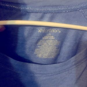 Gently used long sleeved purple t-shirt